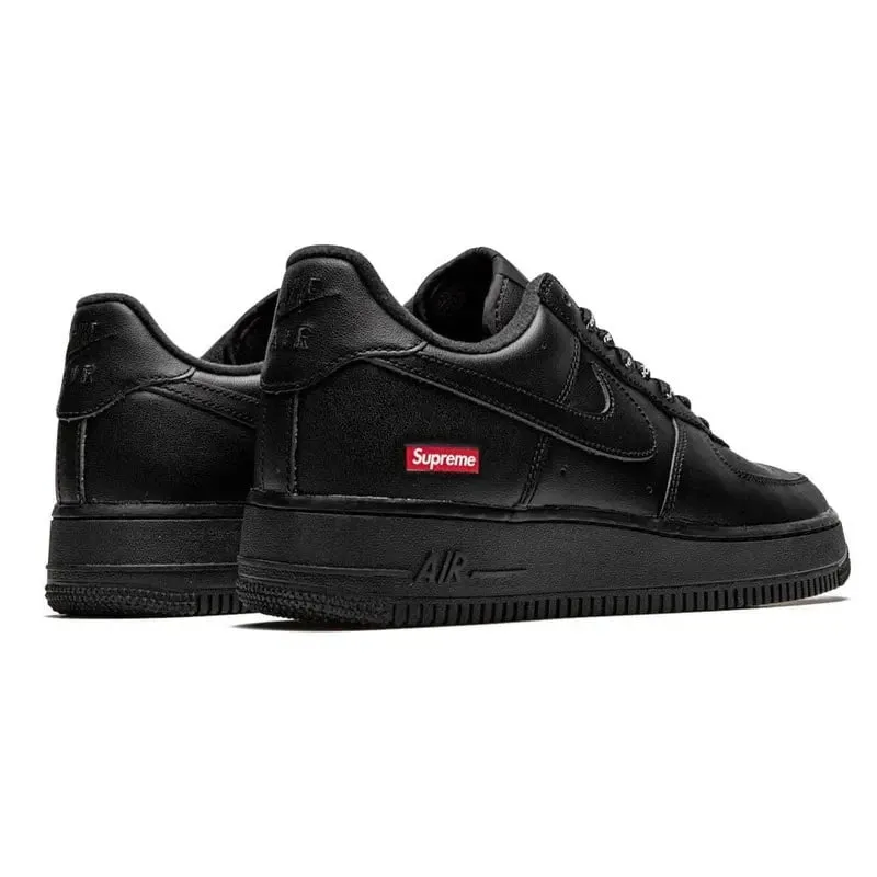 The Nike Air Force 1 Low x Supreme Box Logo in Black is a highly coveted sneaker collaboration released in 2020. 
This low-top shoe features a sleek design with a leather upper Size 8M image 2